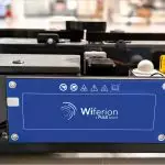 eisenmann wiferion painting process varnishing wireless charging agv